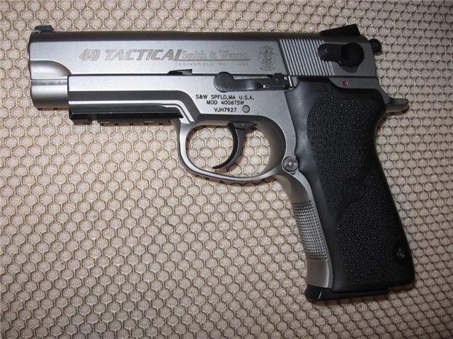 Name:  S&W 4006.jpg
Views: 167
Size:  131.9 KB