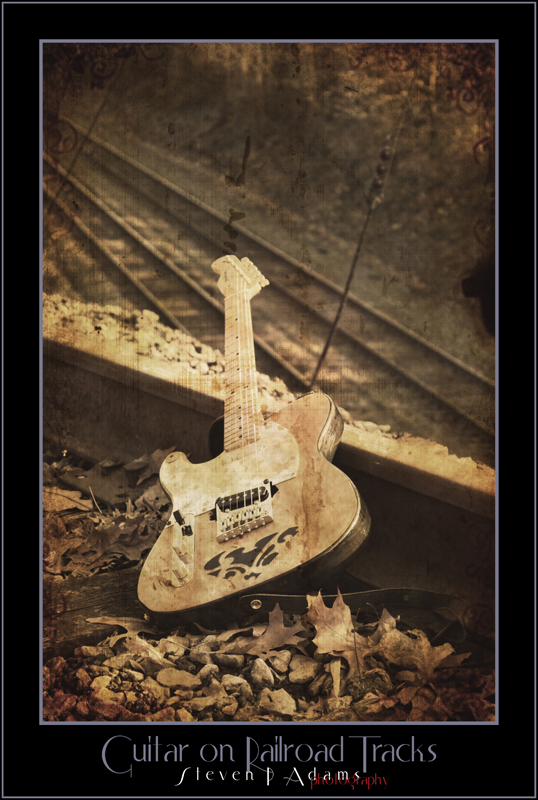 Name:  T1i_7360GuitaronRailroadTracksPresentationcopy.jpg
Views: 38
Size:  327.8 KB