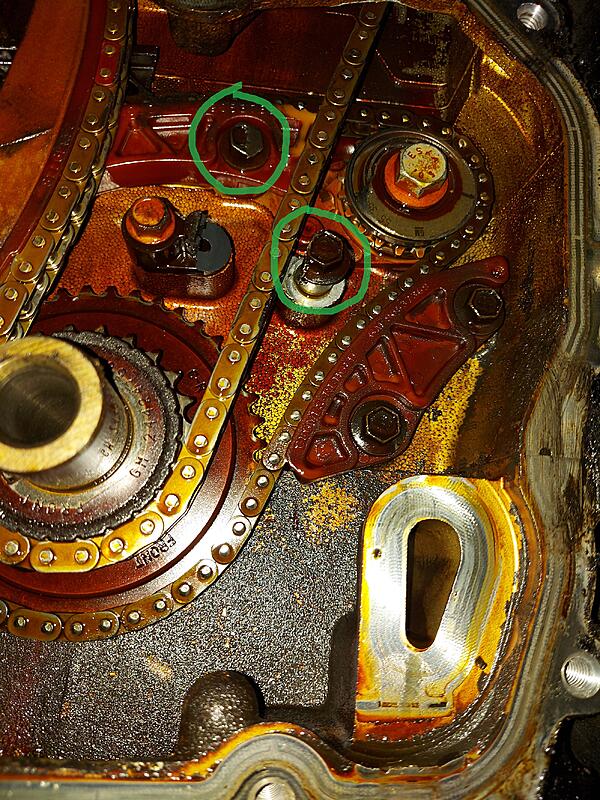 Metal shavings in oil-bolts.jpg