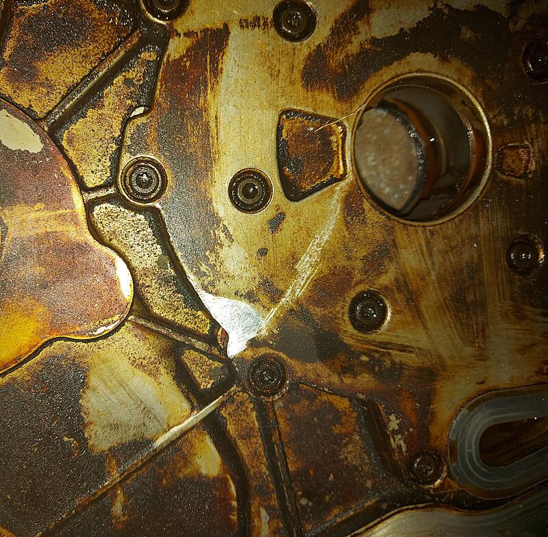 Metal shavings in oil-cover.jpg
